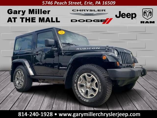 2013 Jeep Wrangler Rubicon in Black Clearcoat — front three-quarter view