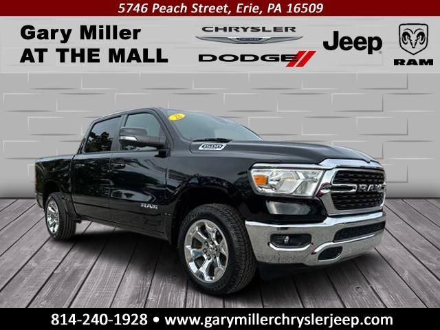 2022 RAM 1500 Big Horn Crew Cab 4x4 5'7' Box in Diamond Black Crystal Pearlcoat — front three-quarter view