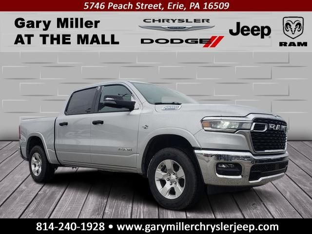 2026 RAM Ram 1500 RAM 1500 BIG HORN CREW CAB 4X4 5'7' BOX in Silver Zynith Exterior Paint — front three-quarter view