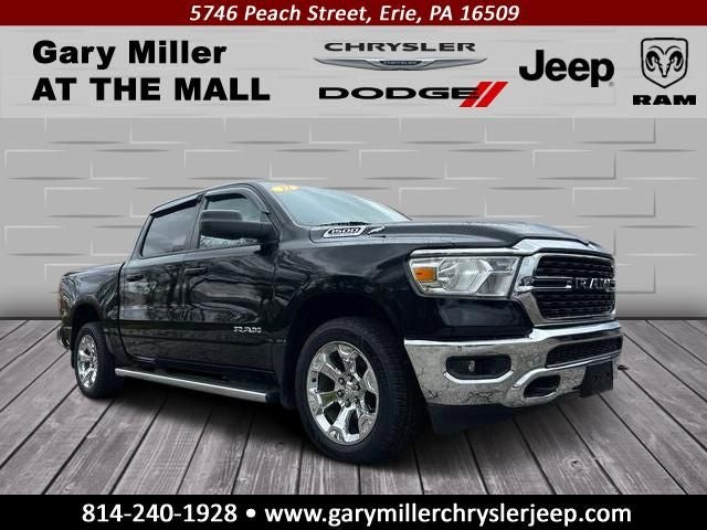 2022 RAM 1500 Big Horn Crew Cab 4x4 5'7' Box in Diamond Black Crystal Pearlcoat — front three-quarter view