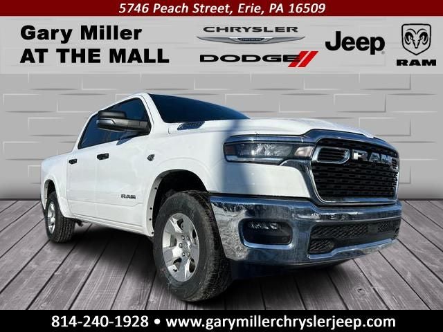 2026 RAM Ram 1500 RAM 1500 BIG HORN CREW CAB 4X4 5'7' BOX in Bright White Clear-Coat Exterior Paint — front three-quarter view