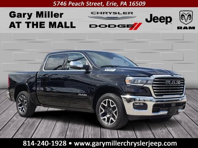 2026 RAM Ram 1500 RAM 1500 LARAMIE CREW CAB 4X4 5'7' BOX in Diamond Black Crystal Pearl-Coat Exterior Paint — front three-quarter view
